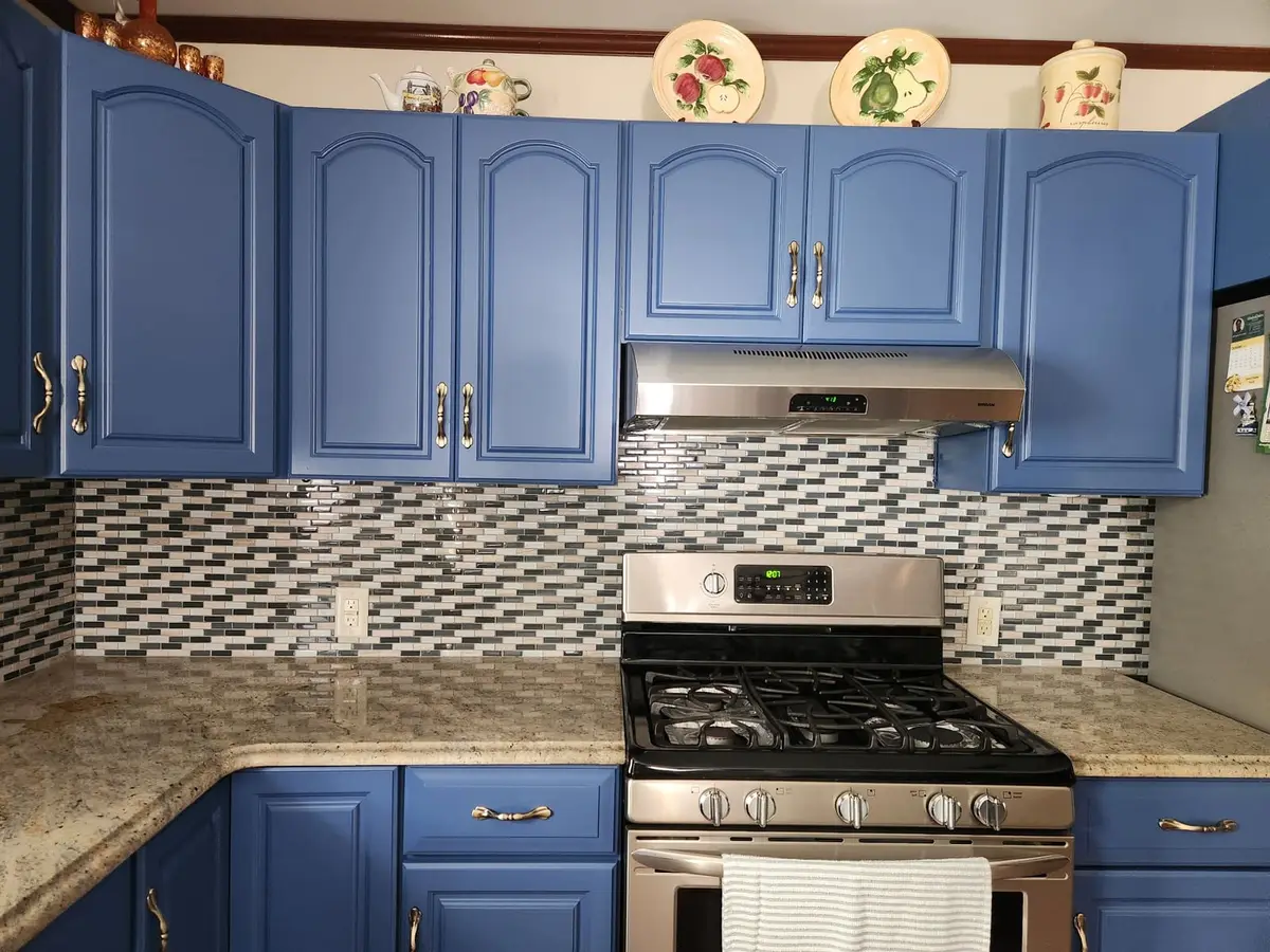 Glass Mosaic Backsplash — Beautiful glass mosaic tile in horizontal brick pattern with blue, brown, and cream tones