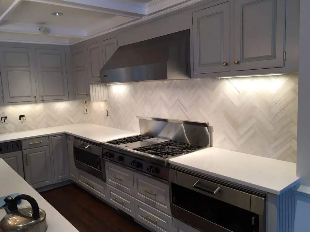 Marble Herringbone Pattern — Sophisticated white marble in classic herringbone layout
