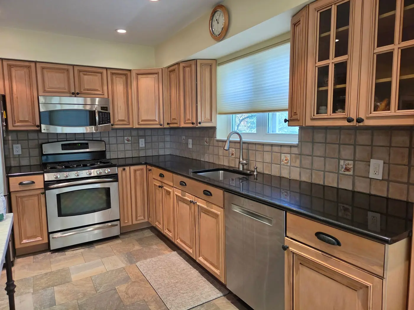 Dated kitchen wall in Scarsdale NY before the backsplash was installed